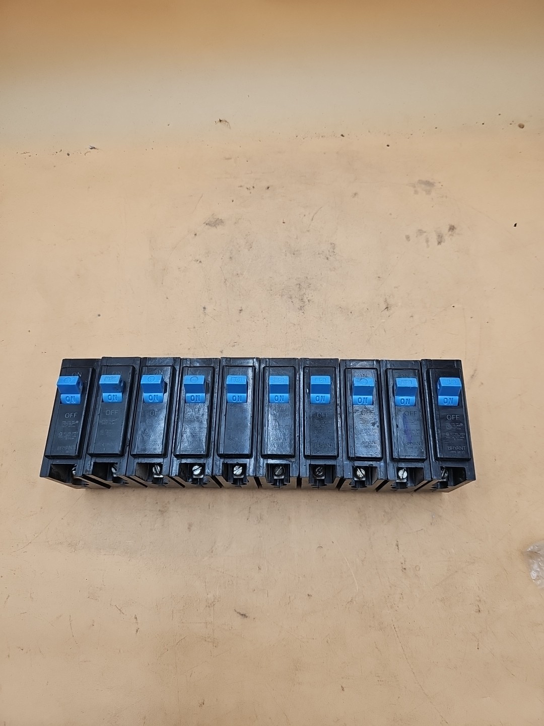 LOT OF 10 Bryant BR115 1 Pole 15 AmpType BR Plug On Circuit Breakers