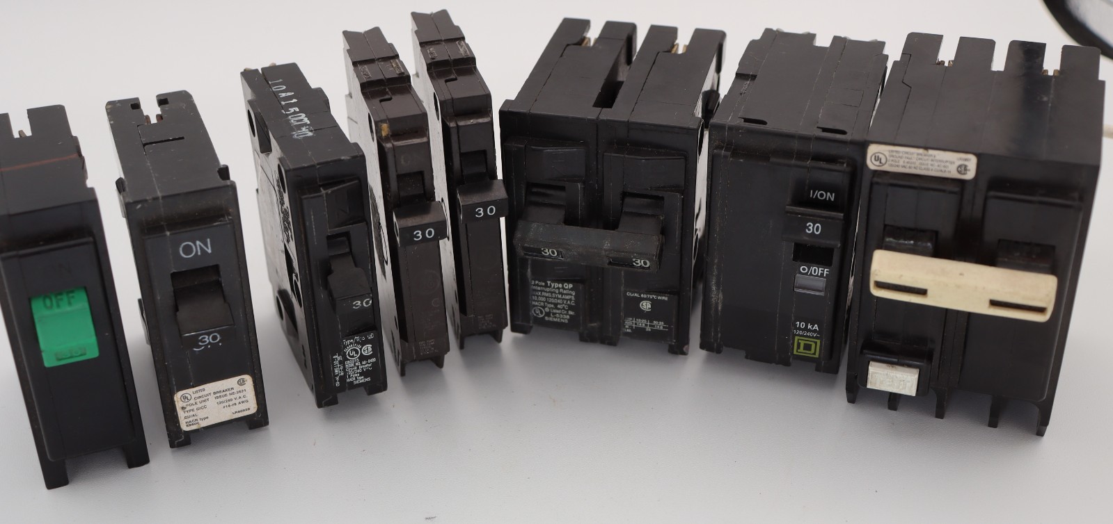 Assorted lot of 8- 15 Amp 1 and 2 Pole Circuit Breakers *See Description*