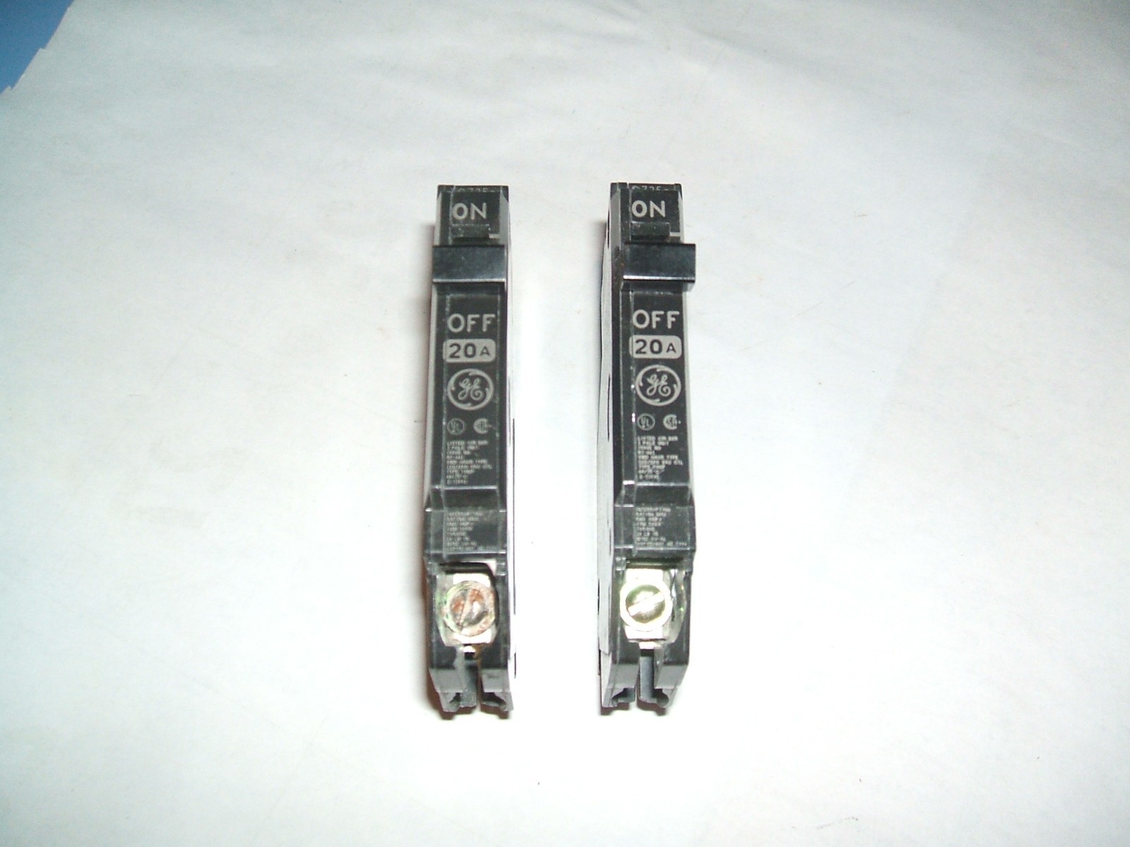 2 NEW THQP120 GE THIN LINE CIRCUIT BREAKERS 1 WITH MINOR RUST ON SCREW UNUSED