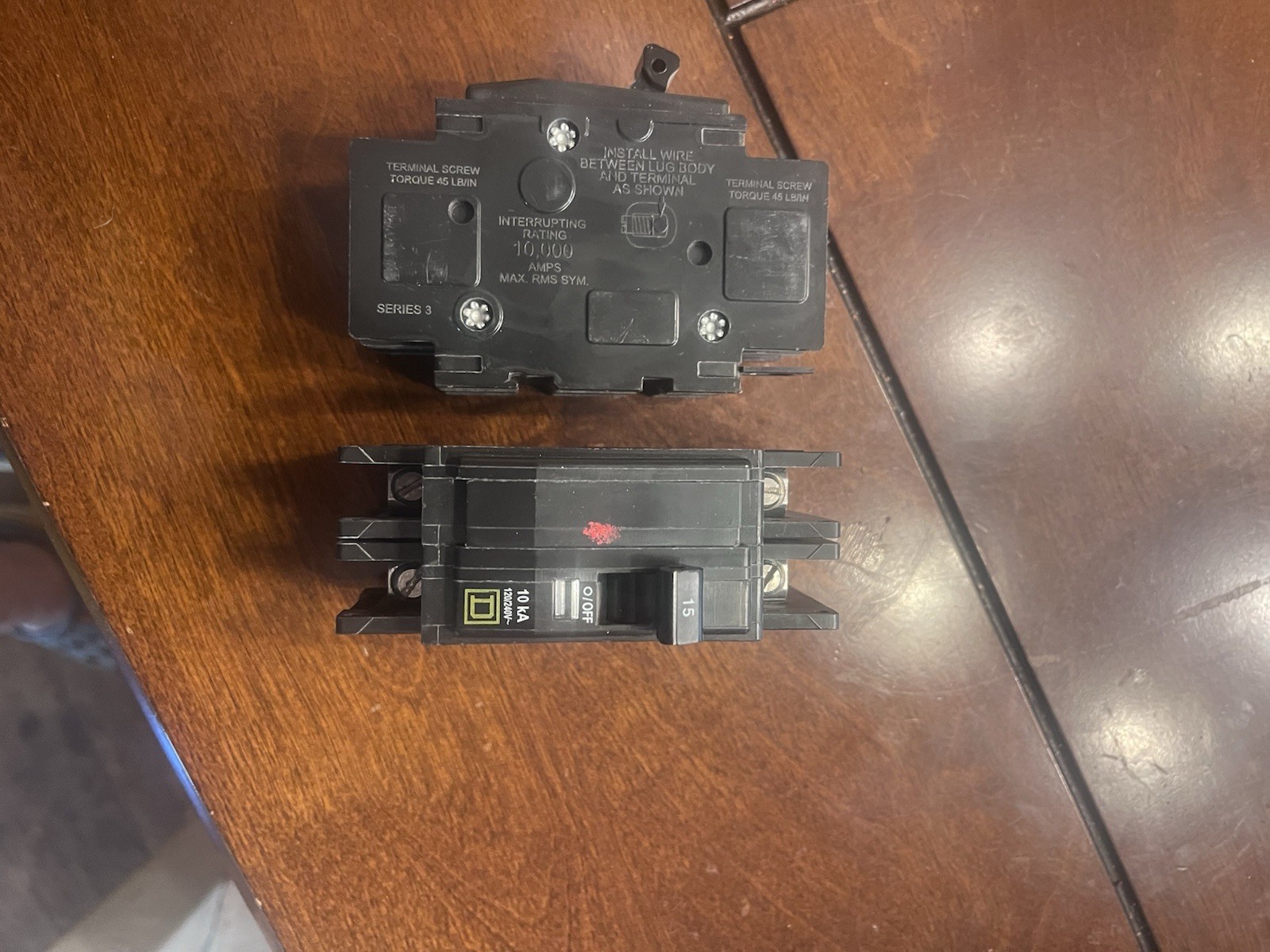 a pair of Square D Din Rail 2-pole 15 Amp