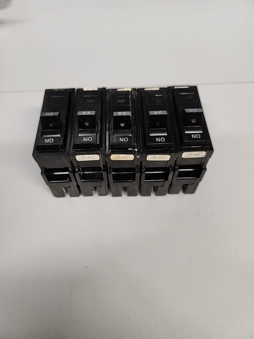 LOT OF 5 GENERAL ELECTRIC 20 AMP CIRCUIT BREAKERS. THQL1120