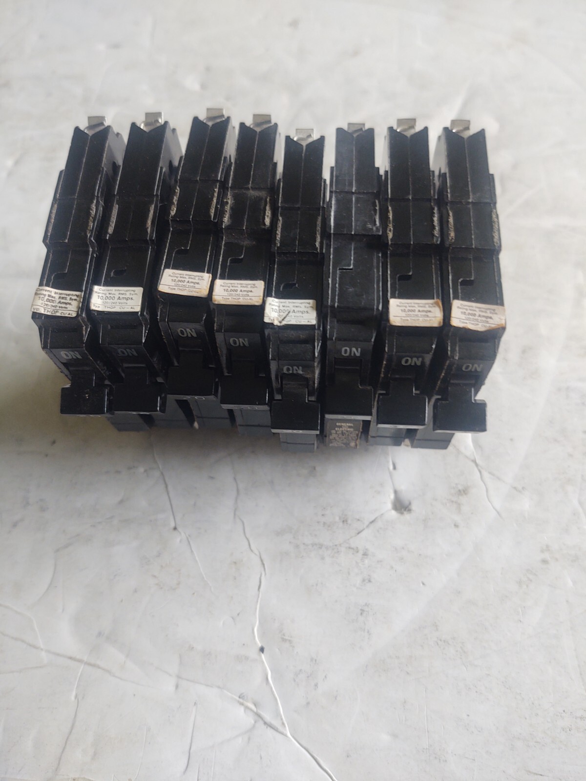(8) GENERAL ELECTRIC # THQP120 / 20 AMP, 1 POLE, 120/240, THIN CIRCUIT BREAKER.