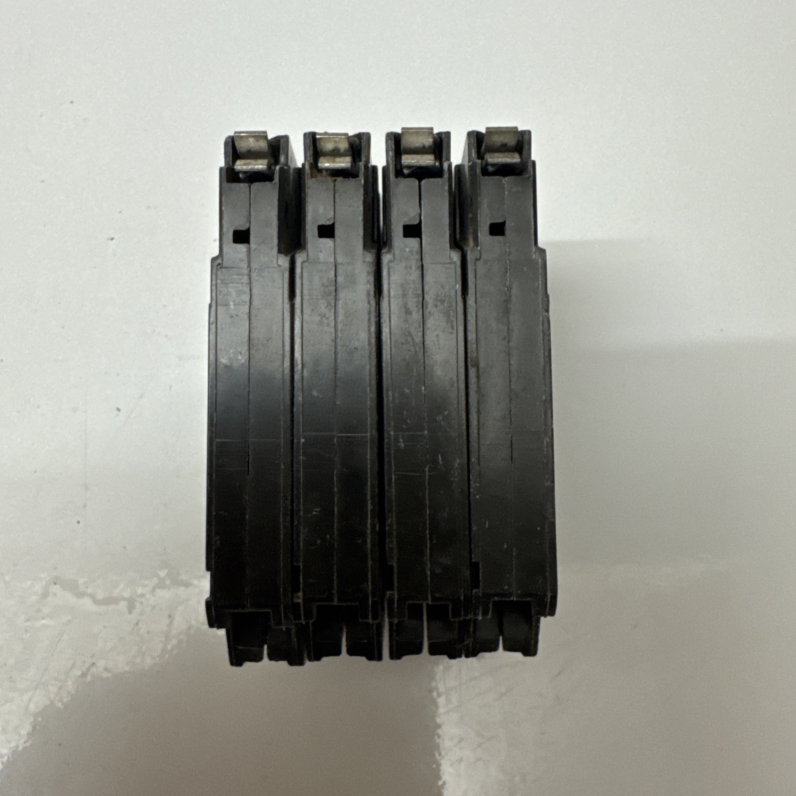 (4)- GE THQP115 15A 120V 1 POLE TYPE TQP CIRCUIT BREAKER- LOT OF FOUR